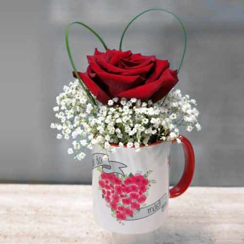 Flowers In Ceramic Cup